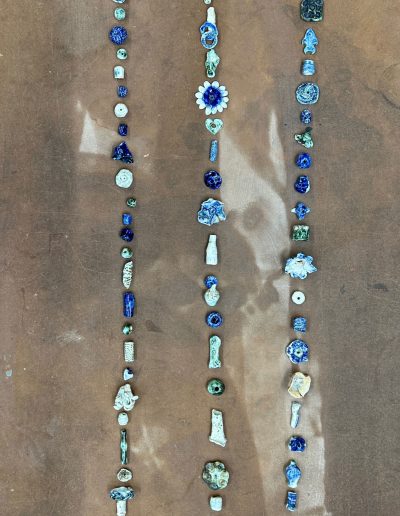 Susie Johnston & Susie Dalton, Porcelain, oxides and glaze. Hand made beads for Fragments of the Tay install proposed for August 2023.